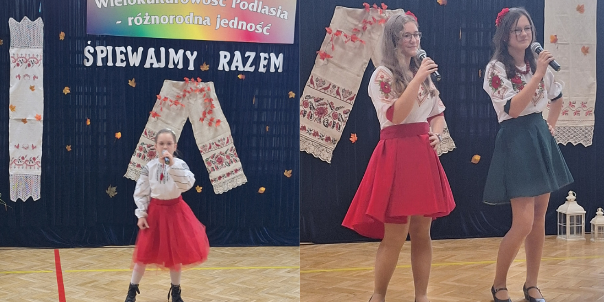 uczennice  w ludowych strojach białoruskich  śpiewją.png